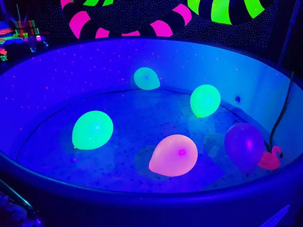 hot tub hire tent decorated in uv neon theme