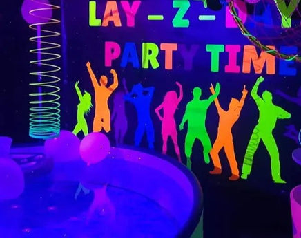 Uv Hot tub hire package with glow in the dark neon party decorations